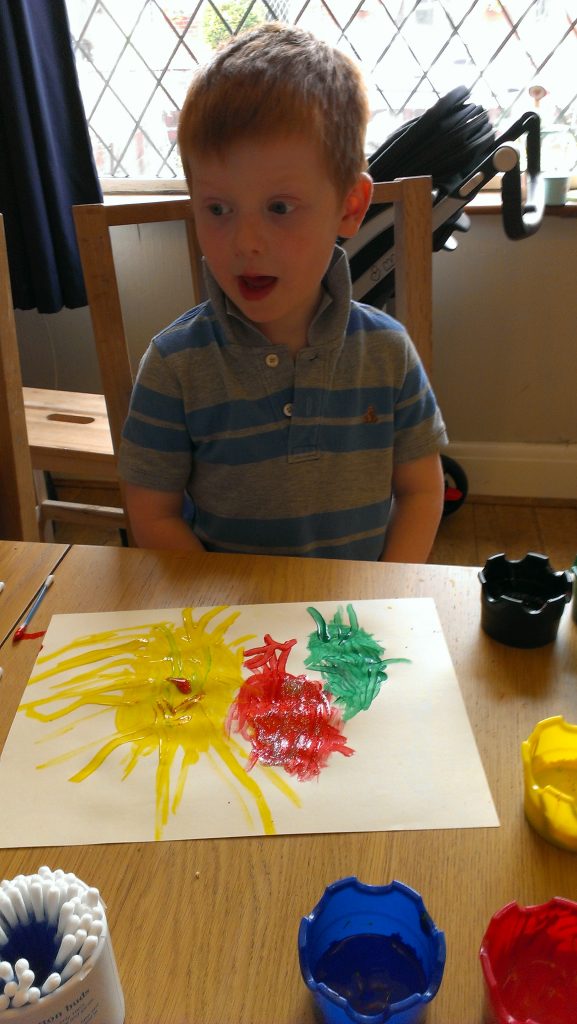 Making monsters with cotton buds and poster paint