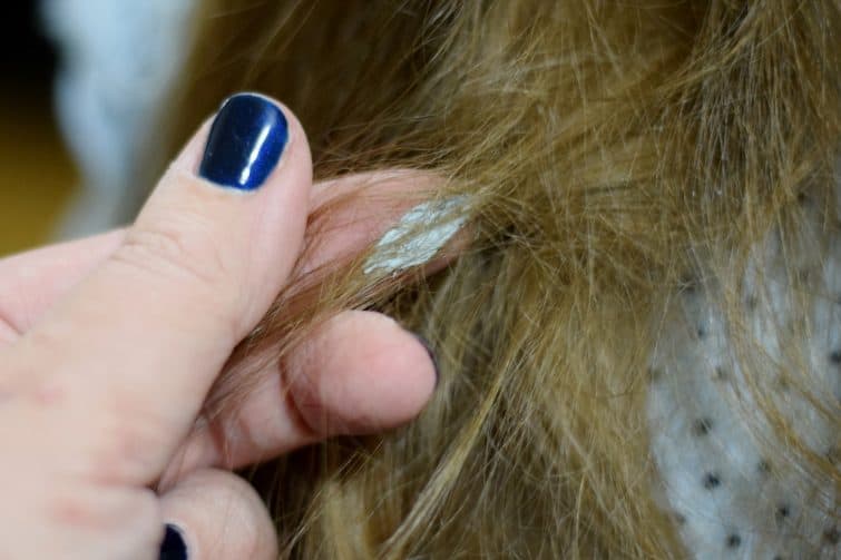 lump of blue tack stuck in long hair