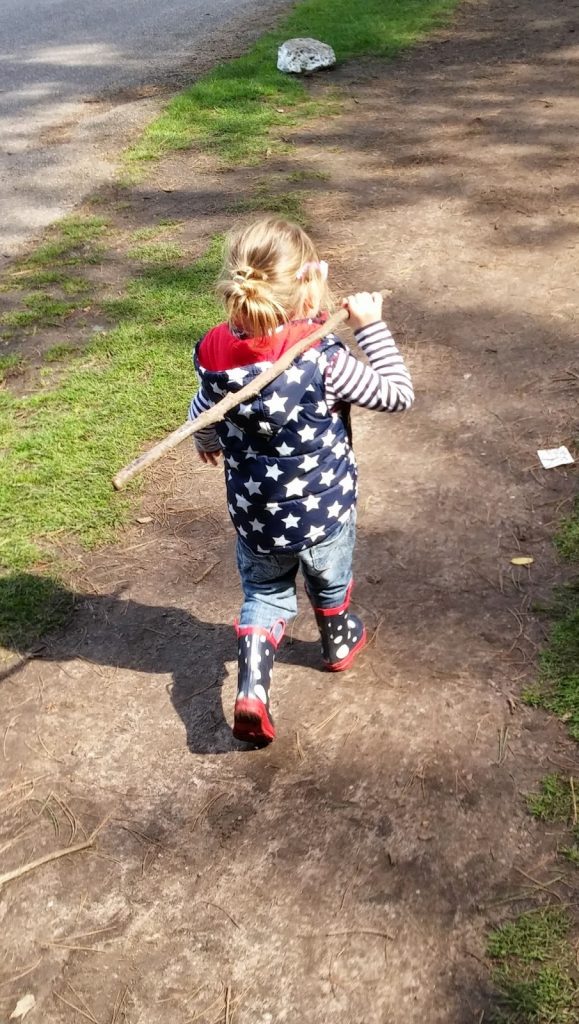 Nature Misses You - child carrying stick