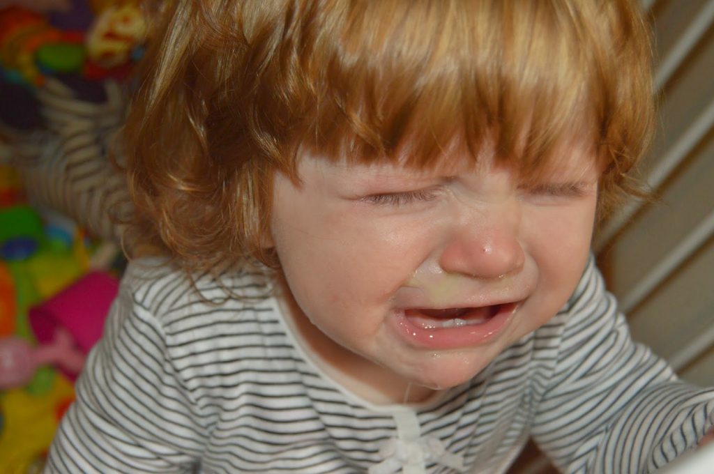 sad snotty baby