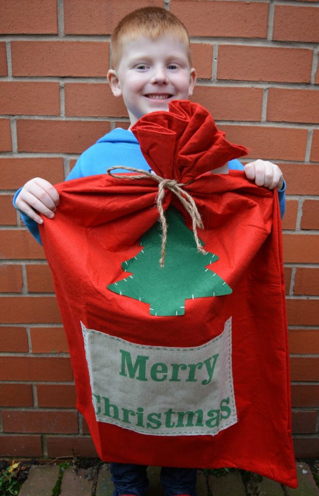 The Christmas Boutique - Large red felt sack
