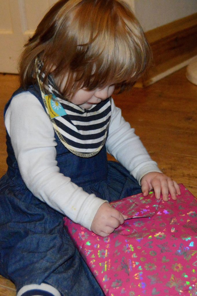 Opening birthday presents Opening birthday presents