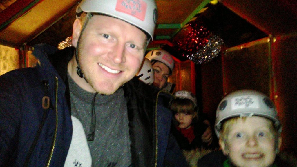 Family selfie visiting Father Christmas at Bounce Below