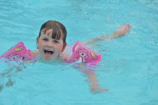 Chloe swimming with arm bands