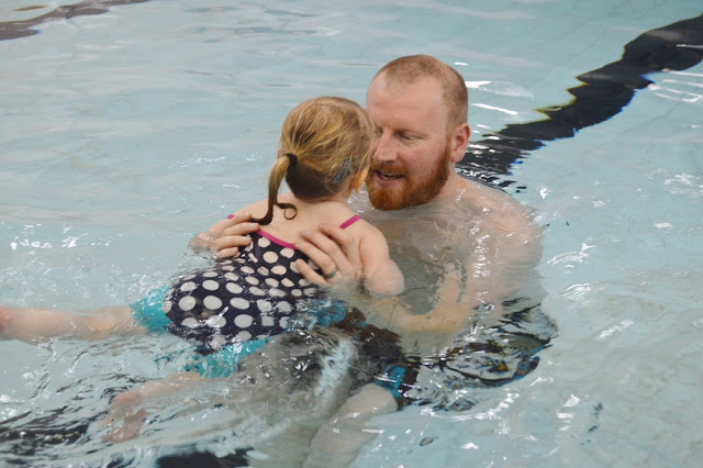 Little girl learning to swim with Puddle Ducks
