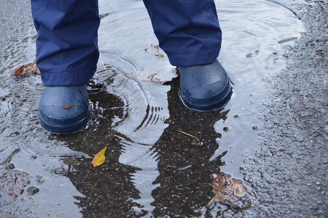 Muddy Puddles waterproof trousers in puddles