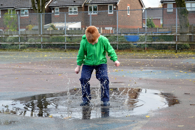 Jumping in puddles wearing Muddy Puddles Puddlefleece Trousers