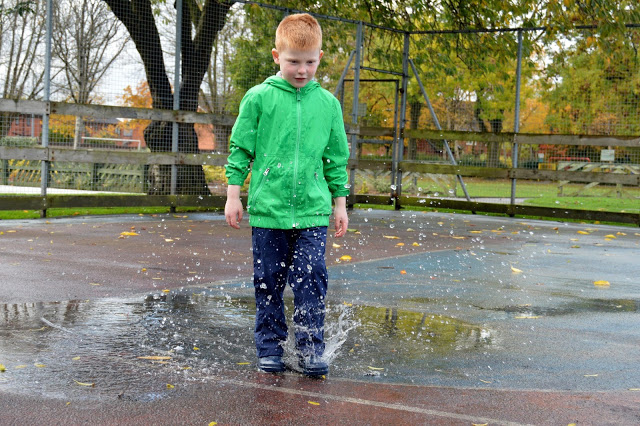 Splashing in puddles in Muddy Puddles Puddlefleece Trousers