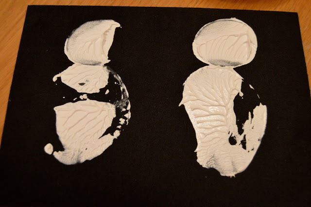 Potato print snowmen - prints on black card