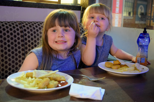 The girls enjoying their dinner at Peachy Keens, The Printworks