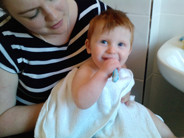 Brushing baby's teeth - Nelson Teetha
