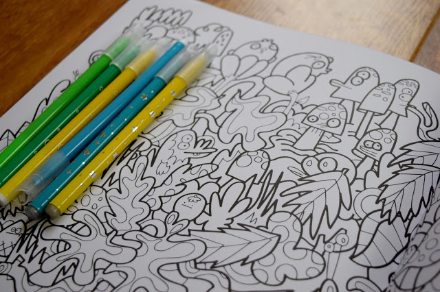 felt tip pens and colouring book