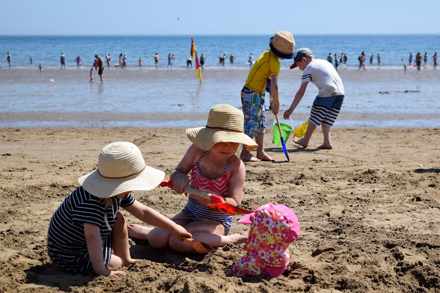 children playing on the beach