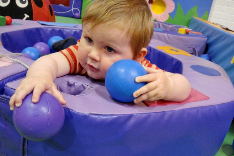 baby in a ball pool