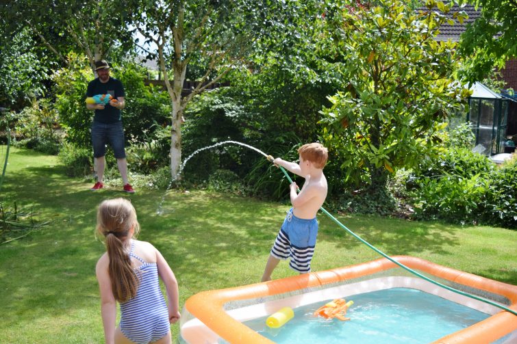 Water fight in garden