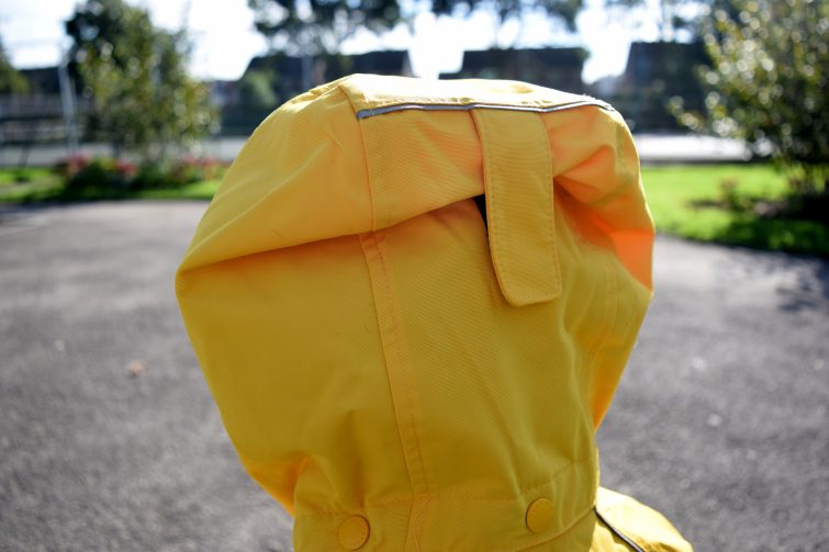 adjustable hood on Polarn O. Pyret Yellow Shell Jacket