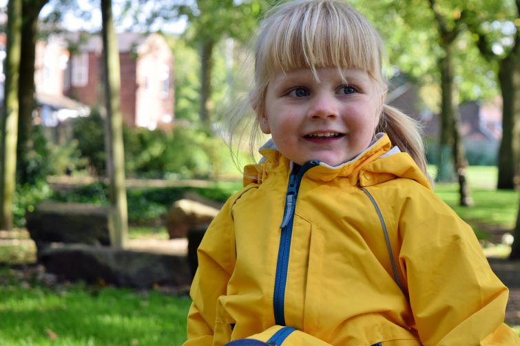Little girl wearing yellow coat from Polarn O, Pyret