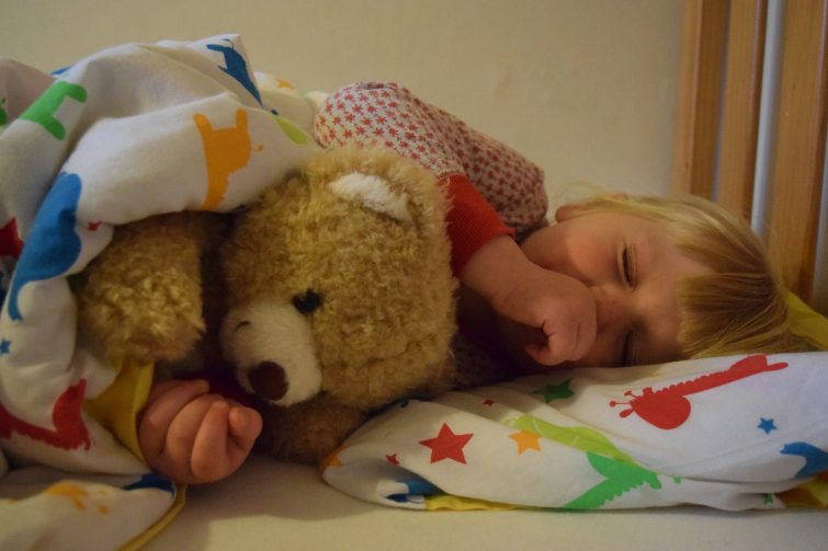 Amy sleeping with Sleep Tight All Night Teddy