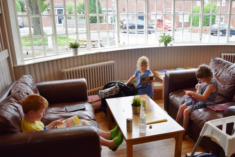 Kids enjoying the cosy cafe area at Aqua Nurture, Gee Cross