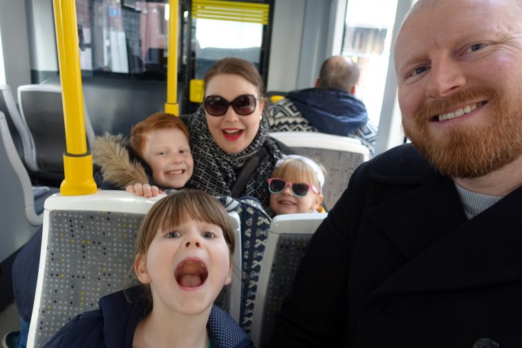 Ordinary Moments - half term, family on tram