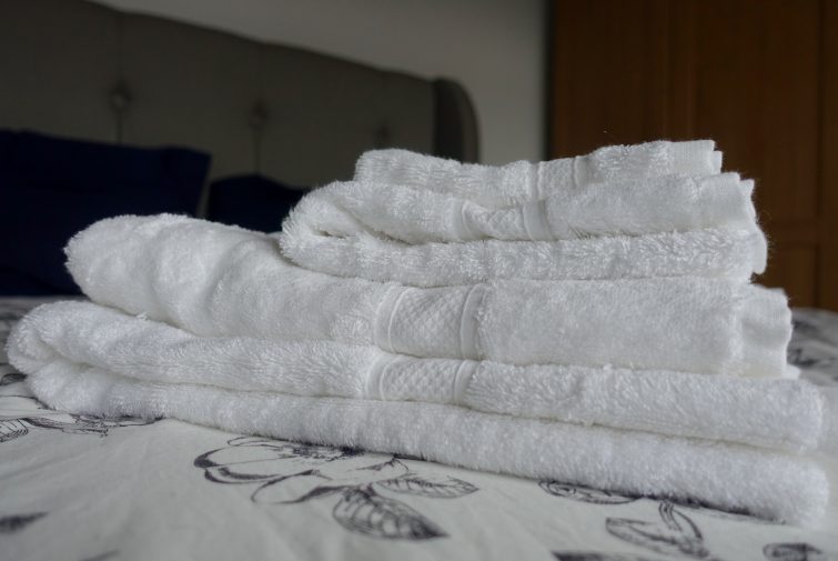 stack of white Bamboo Towels from The Towel Shop