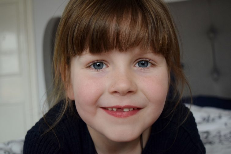 Little girl with gappy smile
