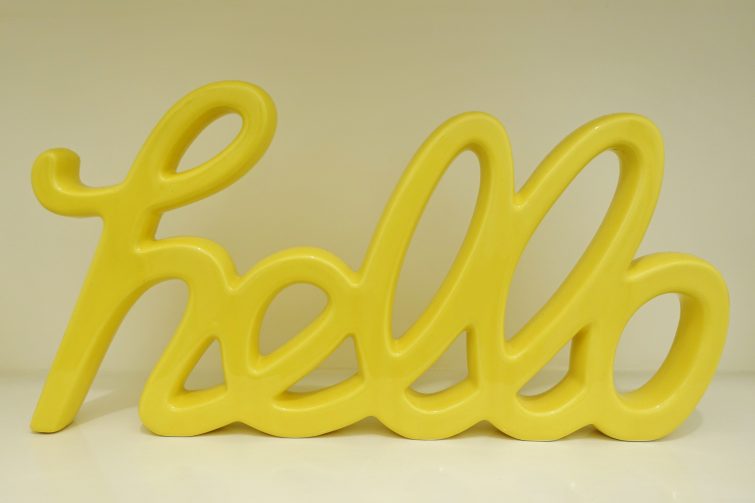 yellow hello ornament from Next