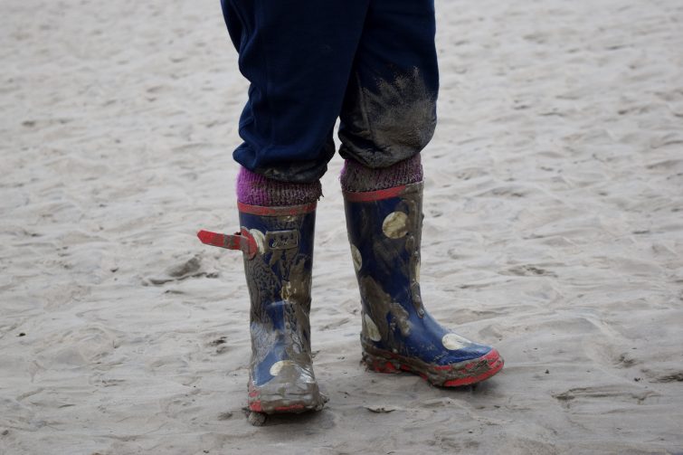 Muddy boots after getting stuck in the sinking sand!