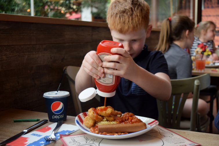 Enjoying a meal at Huck's American Bar & Grill at Center Parcs Whinfell Forest