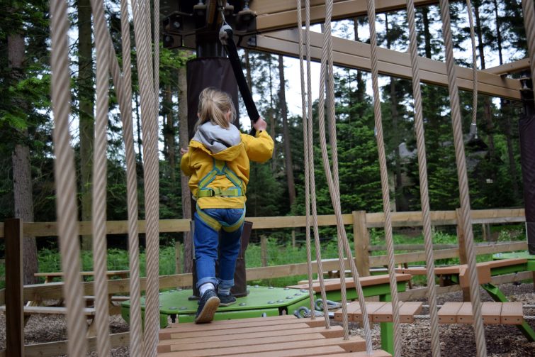 Child enjoying the Mini Trek adventure at Center Parcs Whinfell Forest
