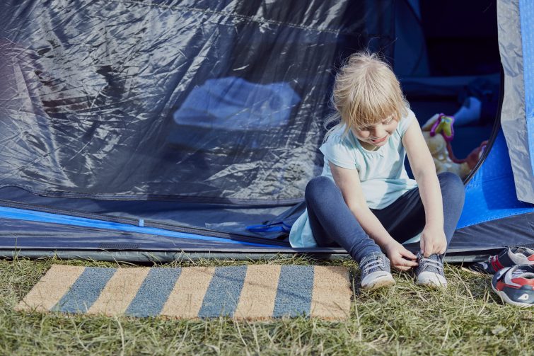 A navy stripe IKEA doormat outside our EUROHIKE Bowfell 600 Tent