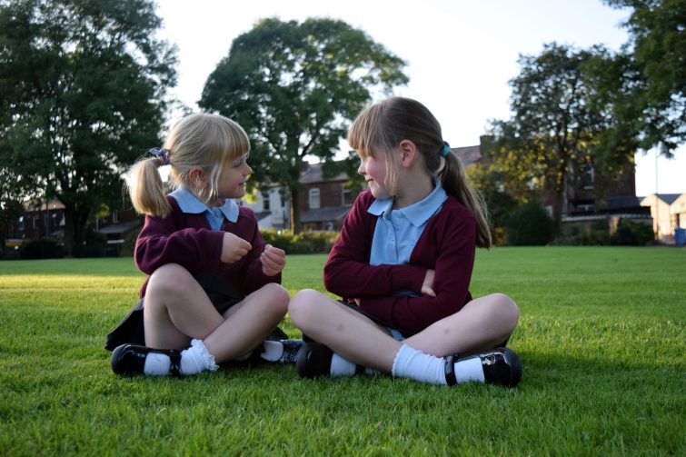 Siblings in school uniform and Start-rite shoes