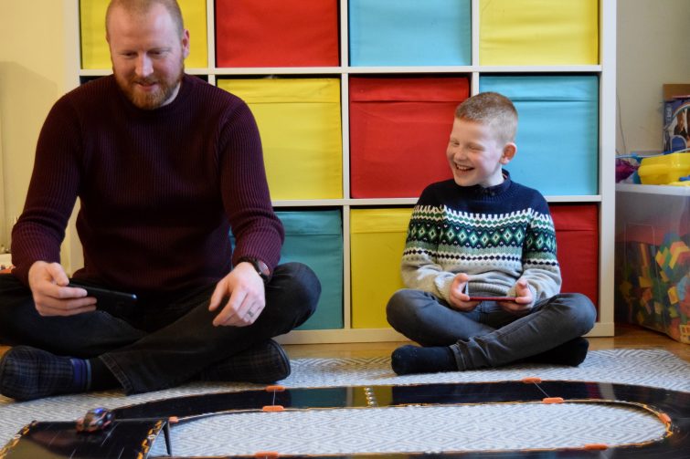 Boys racing the Anki Overdrive Starter Kit