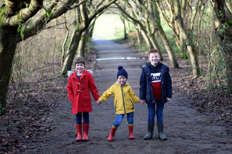 Brother and sisters in the woods