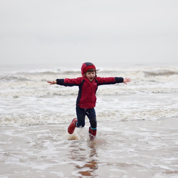 Playing in the sea in January