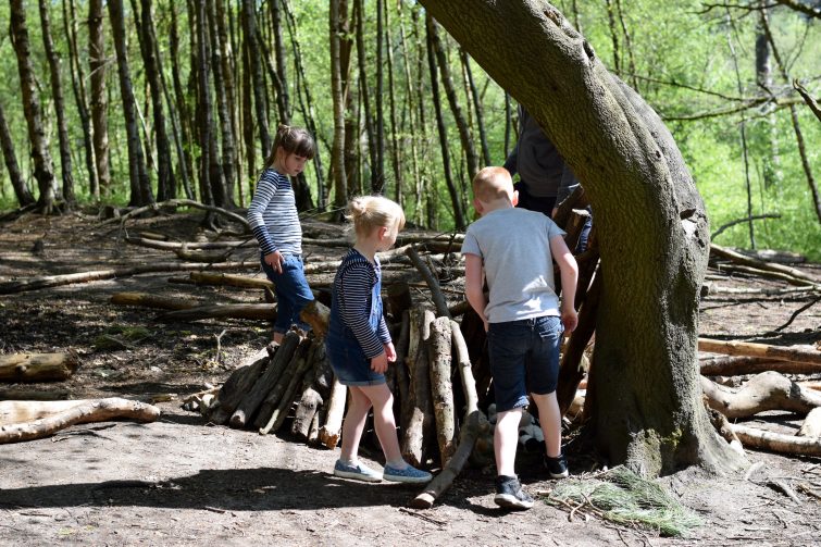 Outdoor Classroom Day - Working as a team to build a den