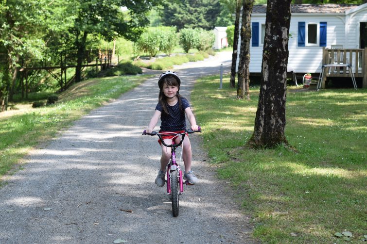 Bike riding on the campsite at Chateau de Lez Eaux
