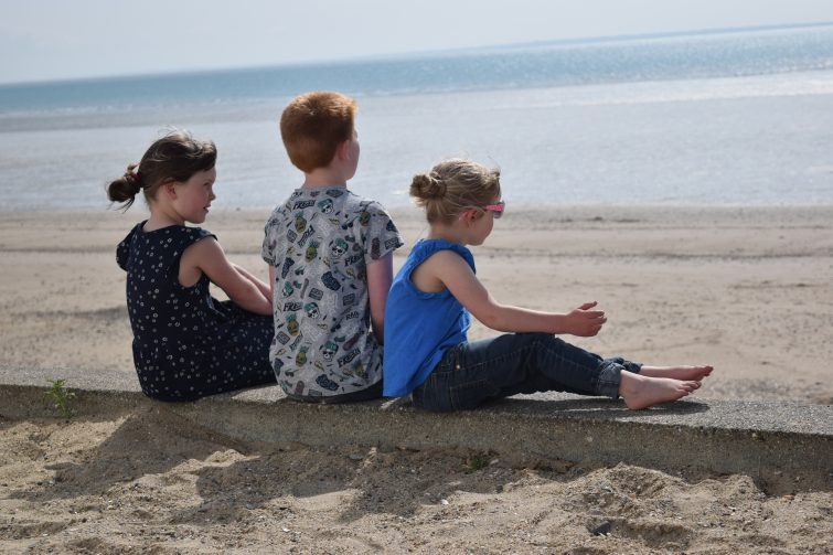 Children enjoying some time on the beach