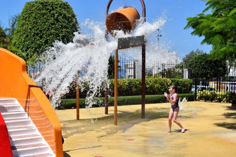 Huge splash from bucket of water at Holiday Village Tenerife Spash Park