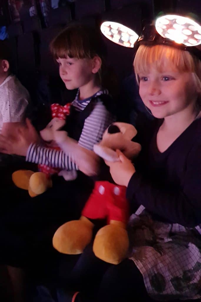 Disney on Ice Dream Big -little girl watching show with smile on her face