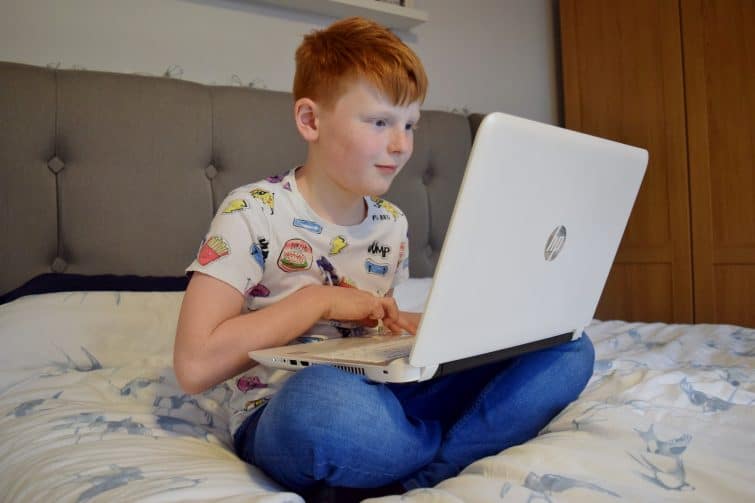 Boy using laptop