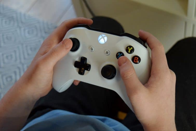 xbox controller in boy's hands