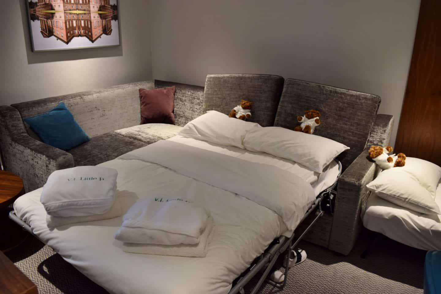 sofa bed in hotel room