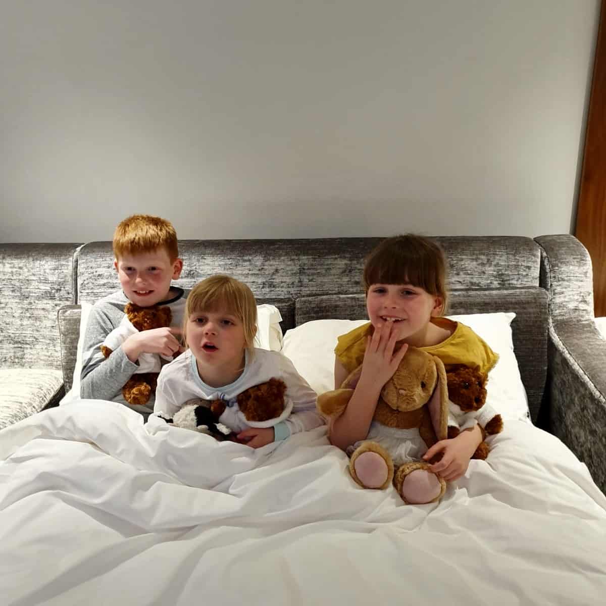All tucked up in bed watching tv - hotel luxury