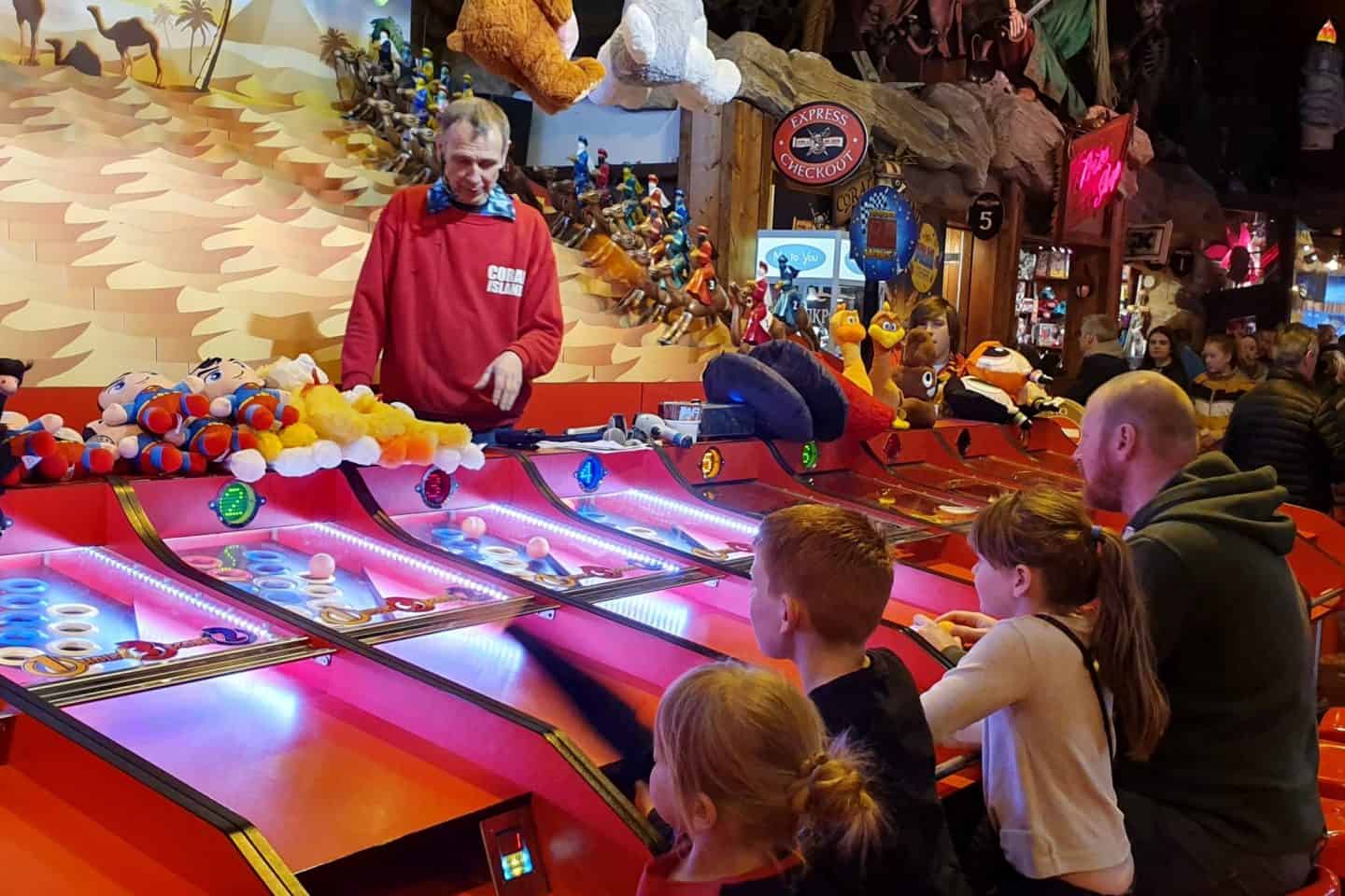 Kids playing the Camel Derby at Coral Island, Blackpool