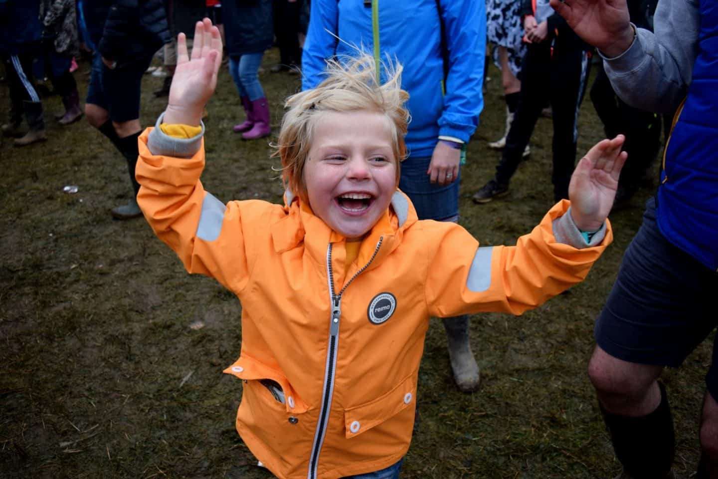 Little girl dancing at a festival