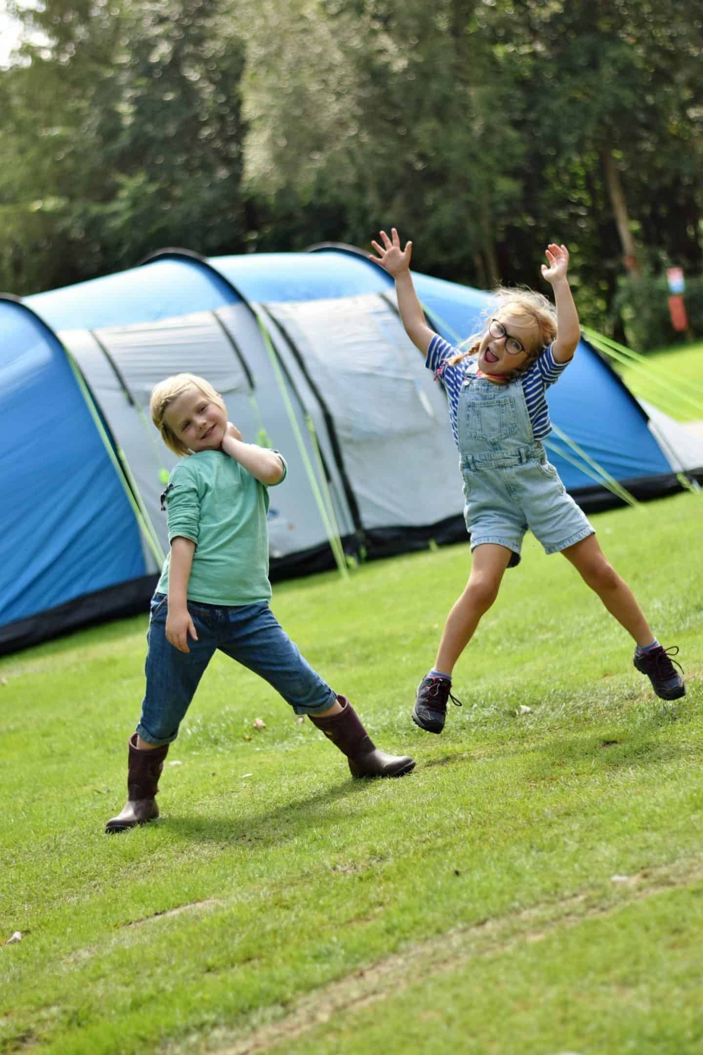 Best friends having fun camping together