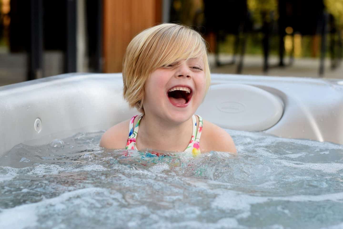 Little girl in hot tub at Darwin Forest