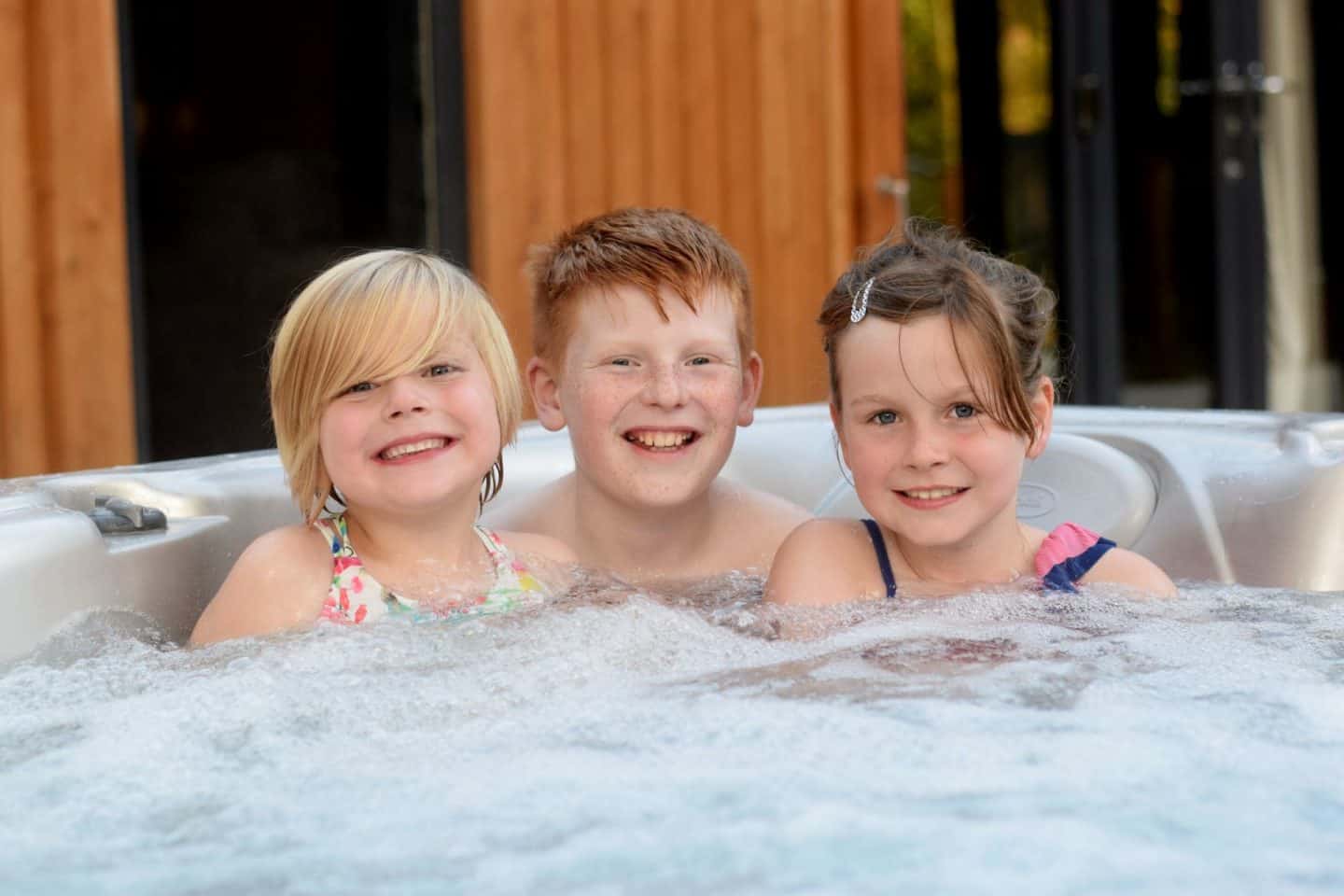 Darwin Forest hot tubs - three kids in the the hot tub