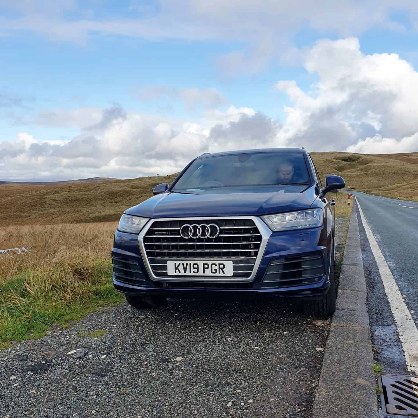 Navy blue Audi Q7 hired for the weekend from Audi on demand Oldham